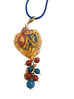 Collana con cuore sacro decorato