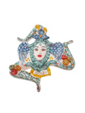 Trinacria da muro in ceramica di Caltagirone. Cm 30