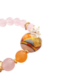 Bracciale rosa con sfera in ceramica