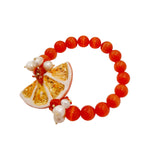 Bracciale con arancia in ceramica
