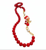 Collana lunga rossa con sferetta in ceramica