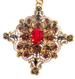 Collana con ciondolo con dettagli floreali in ottone e cristalli