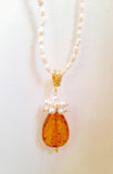 Set collana e orecchini in ambra e perle naturali