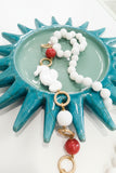 Collana lunga con cavalluccio in ceramica