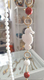 Collana lunga con cavalluccio in ceramica