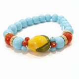 Bracciale con limone in ceramica e pasta di turchese