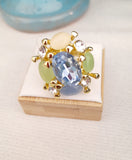 Anello con cristalli, Celeste e verde