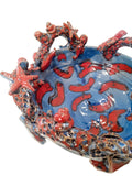 Centrotavola con barriera corallina blu e rosso