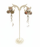 Set collana e orecchini argentati con fiore di cristalli