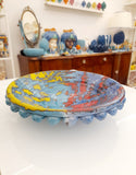 Centrotavola blu con sfumature gialle e rosse, diametro 25-26 cm