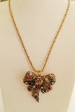 Collana con ciondolo fiocco