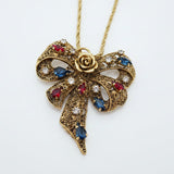 Collana con ciondolo fiocco