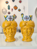Coppia teste di moro giallo ocra h 26 cm