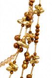 Collana a più fili in metallo dorato e perle ambrate
