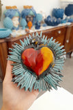 Cuore con raggi verde acqua e arancione 15x14 cm