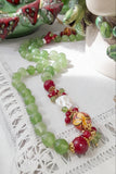 Collana lunga con sfere in ceramica