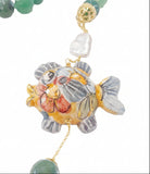Collana verde con pesce in ceramica