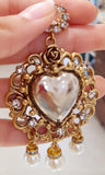 Orecchini in ottone con cuore sacro e perle
