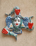 Trinacria da muro in ceramica di Caltagirone. Cm 30