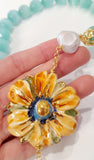 Collana con fiore in ceramica e agata