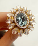 Anello ovale con cristallo centrale azzurro