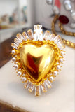 Anello ex voto cuore sacro dorato con cristalli bianchi