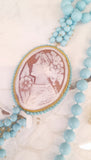 Collana in pasta di turchese con cammeo naturale su conchiglia sardonica