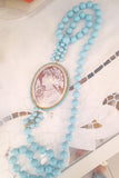 Collana in pasta di turchese con cammeo naturale su conchiglia sardonica