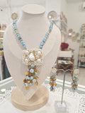 Set Orecchini e collana in larimar, ambra e perle