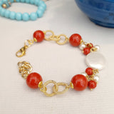 Bracciale maglia con perla maiorca e perle rosse