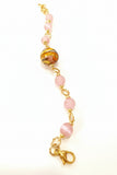 Bracciale rosa con sfera in ceramica