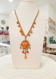 Collana lunga con cuore sacro arancione