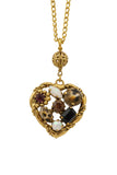 Collana con ciondolo cuore dalle texture differenti