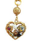 Collana con ciondolo cuore dalle texture differenti