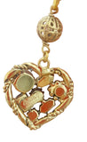 Collana con ciondolo cuore dalle texture differenti