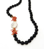 Collana e bracciale in onice, con corallo e perla
