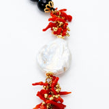 Collana e bracciale in onice, con corallo e perla