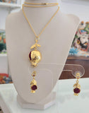 Set collana e orecchini con melograno in metallo dorato e cristalli rossi