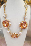 Collana con cristalli bianchi e color ambra
