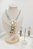 Set Orecchini e collana in larimar, ambra e perle