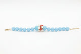 Set collana, orecchini e bracciale con perle naturali, perle in pasta di turchese e corallo