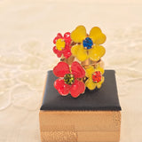 Anelli con motivo fiore con cristalli o smalti in vari colori