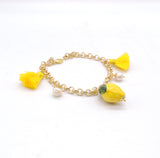 Bracciale Catenella Dorata con Limone in ceramica e Nappe Gialle